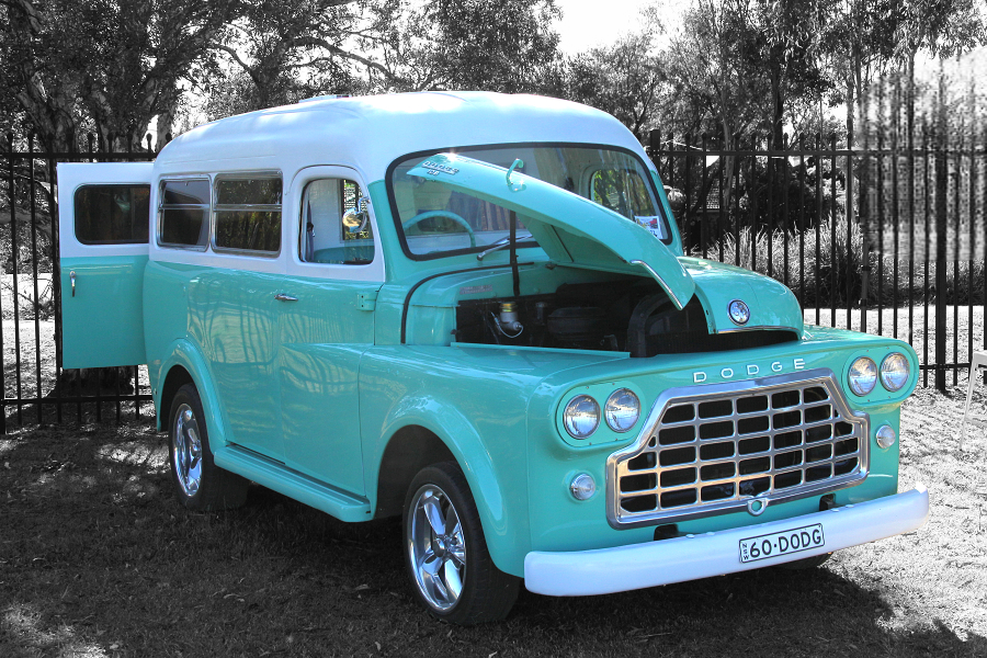 Stunning Vintage Car Hire from Hot Rod Hire Sydney, showcasing a mint-green Dodge Limo with its elegantly raised hood
